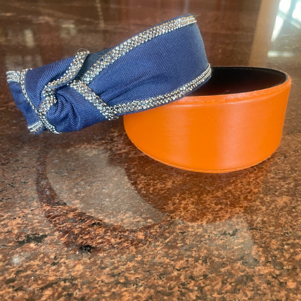 2 headbands. Blue with embellishment. Orange thick headband